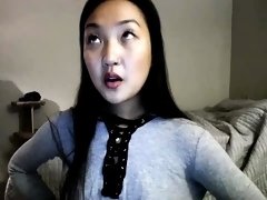 Dazzling Asian teen in tight panties masturbates on webcam