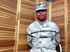 Marine Tied to Chair