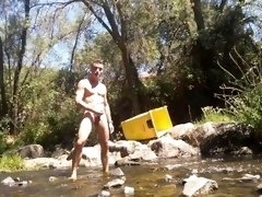 I'm wanking naked in a river until emptying my balls with a great cumshot