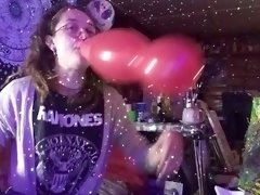 Hairy Hippie Looner Girl With Dreadlocks Inflates Red Balloon