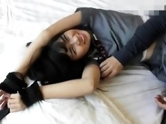 Cute and helpless Chinese teen with sexy legs gets tickled