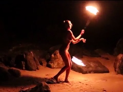 Mysterious milf gives amazing fire dancing performance