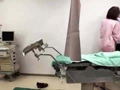 Busty Asian milf sexually satisfied in the doctor's office