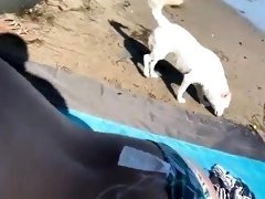 Bodacious babe takes a meat stick for a ride on the beach