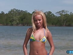 Rough double penetration with a hot blonde in shallow waters