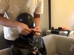 Amateur Asian babe in a black outfit gets trained in BDSM